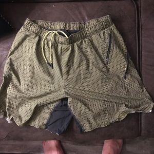 Lululemon yellow and black running shorts